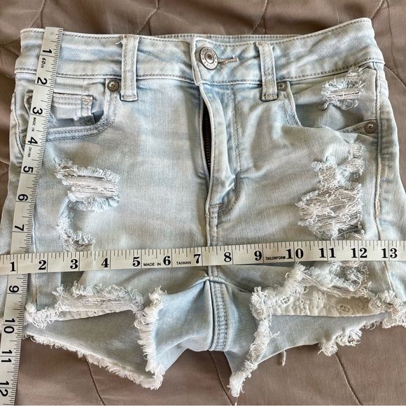 American Eagle Hi Rise Shortie Jean Shorts Light Wash Distressed Size 0 Stretch - Picture 7 of 10